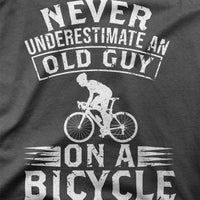 
              Never Underestimate An Old Guy On A Bicycle Organic Womens T-Shirt
            